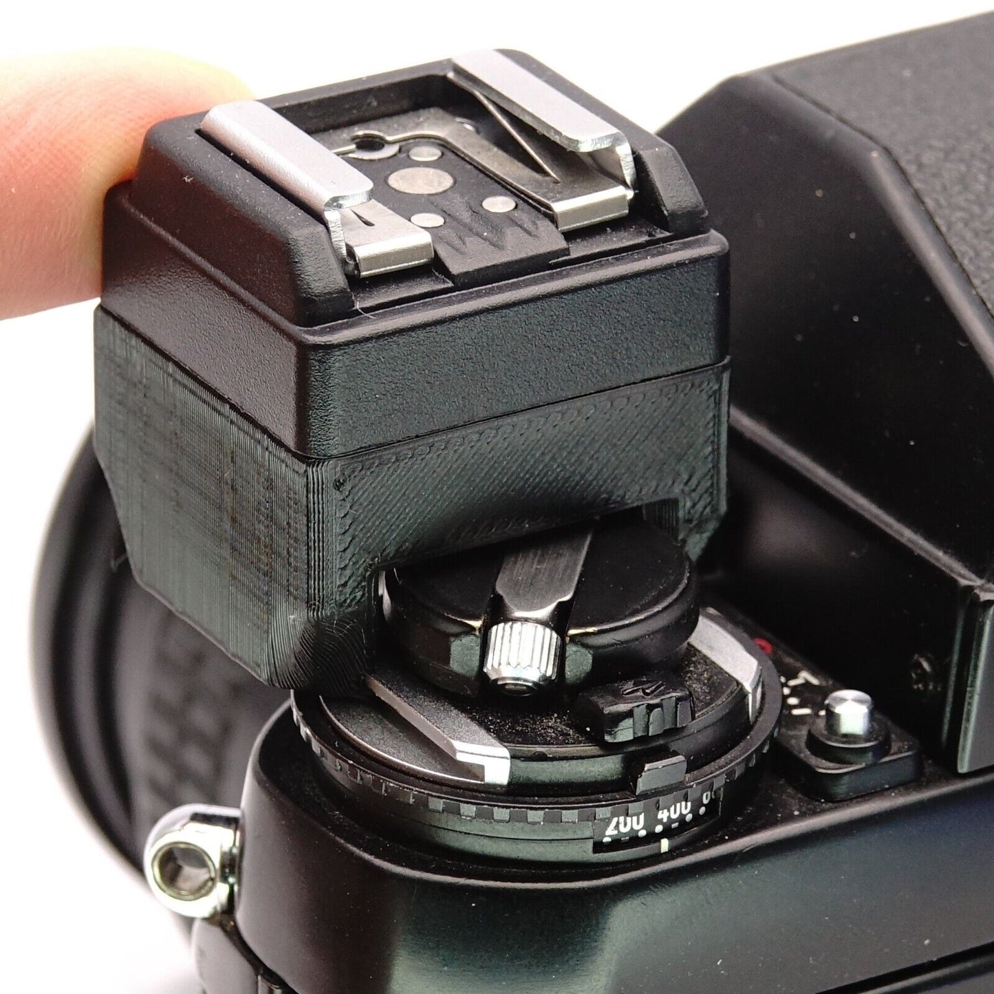 Flash coupler for Nikon F3 and Canon F1