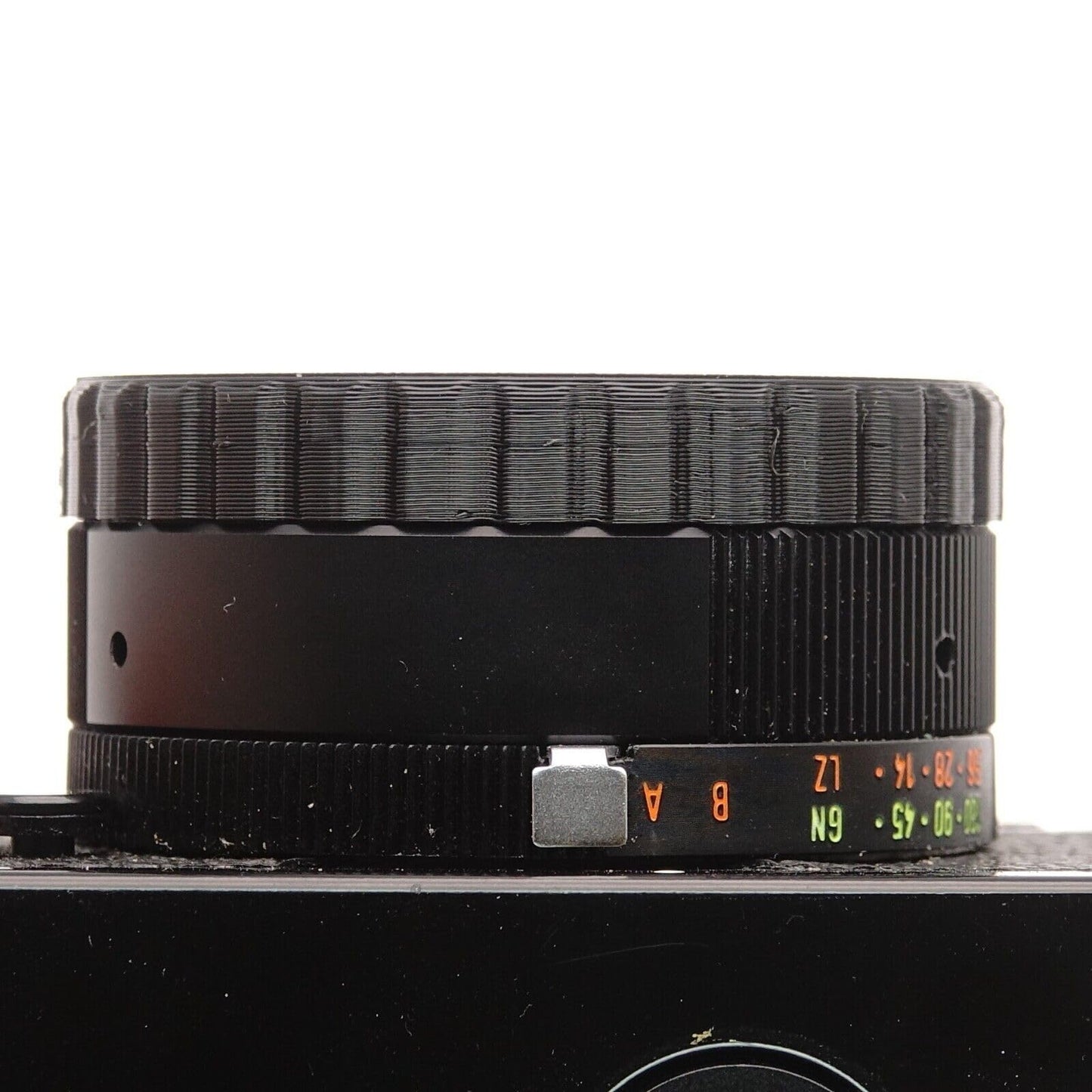 Rollei XF 35 Objektivdeckel für Voigtländer VF 135