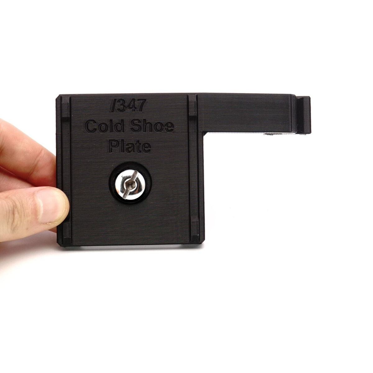 Schwarze Zubehörplatte mit integriertem Blitzschuh, Aufschrift Cold Shoe Plate und Verschraubung für Rolleiflex