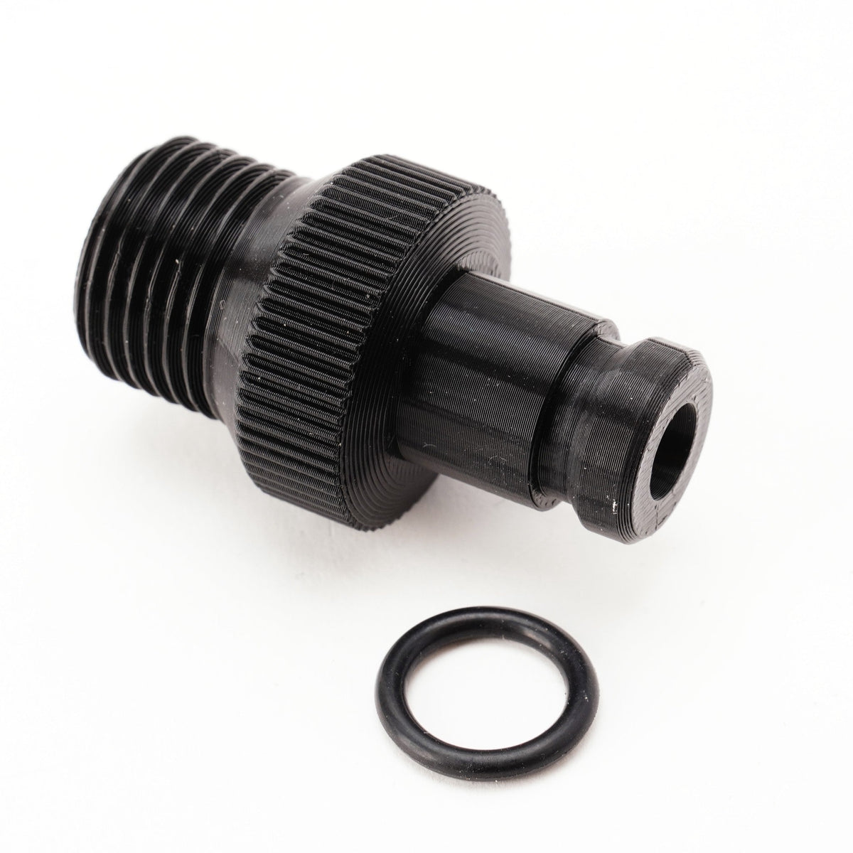 Wässerungsadapter für Paterson Super System 4 mit O-Ring daneben